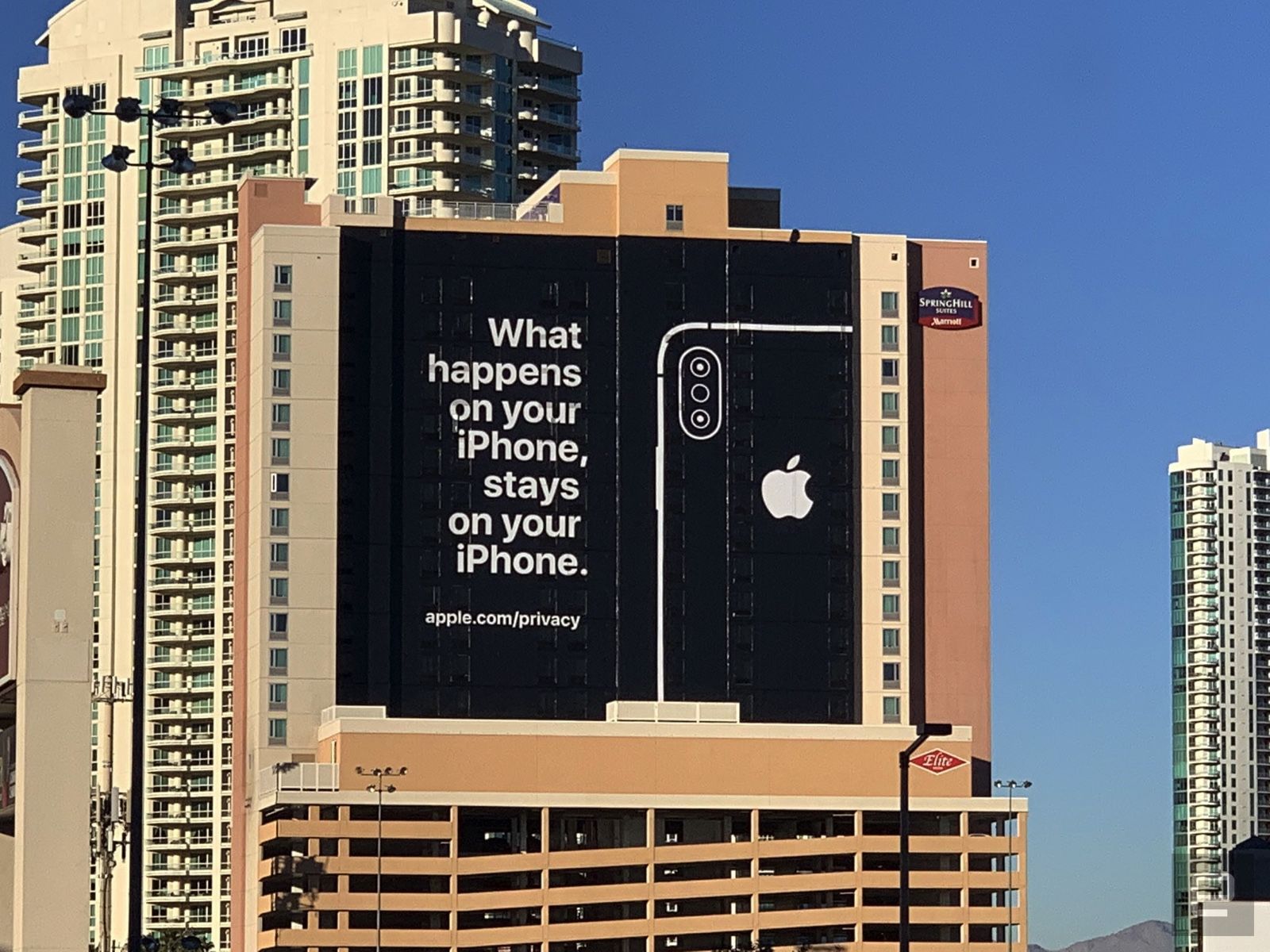 Apple ad on side of building during CES 2019. Reads: ‘What happens on your iPhone, stays on your iPhone.’